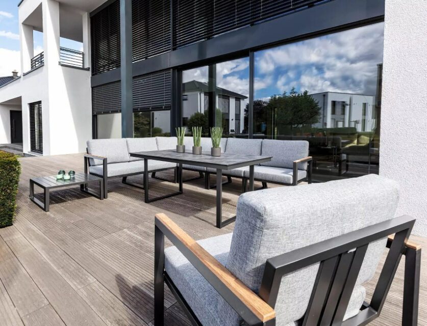 Kettler "Ocean Skid Modular" Casual Dining Set mit Tisch "Skate" und Beistelltisch, 9-tlg., Gestelle Aluminium anthrazit, Polster hellgrau meliert, Armlehnen Teakholz, Tischplatte HPL anthrazit